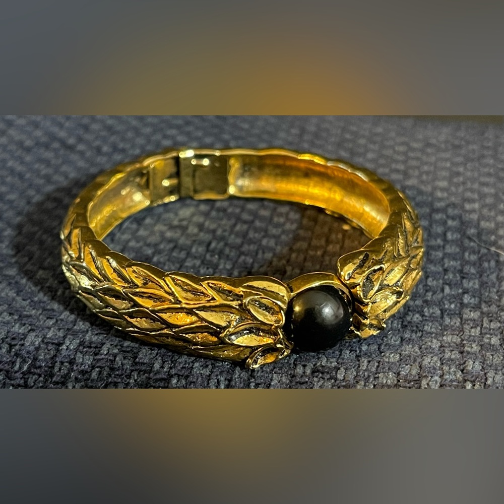 Vintage SJC Hinged Bracelet.  Gold tone with Black Cabichon